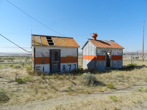 The same two sheds, you can see the faint outline of a 2 on the left one, from the number 12, Portland-Spokane 12