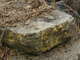 View of the stone with the drill hole.