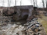 The north parapet of the stone arch culvert.