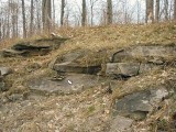 Eyelevel view of the mark embedded in the rock cut.