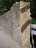 “BM” indicated on the northwest end of the bridge wall.