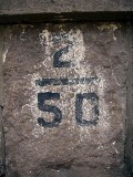 Numbers on the west sidewall of the bridge.