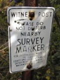 Witness post and sign.