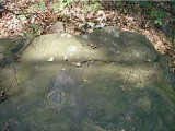 An eyelevel view of the mark on the boulder.