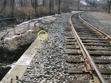 Looking SW along tracks, mark indicated. 