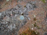 Eyelevel view of the mark on the rock outcrop.