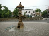 What remains of the fountain in June 2005. The fountain base and rim were removed.