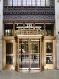 Ornate entrance shows address "233" (Broadway).