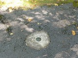 The disk in the concrete monument.