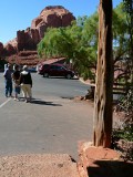 Eyelevel view of the disk set into the corner of the concrete porch; picturesque view of Monument Valley.