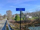 The bridge crosses over Elm Brook.