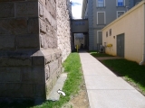 Looking S along the corridor between the jail and the courthouse.