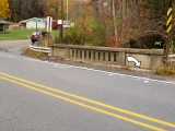 View of the bridge and mark (indicated) from the S side of Rt. 292.