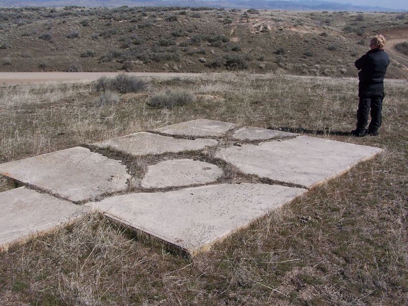 Tail of BCN 27. The location of the suspected monument is near the center of the pad, however most locations of these monuments according to the NGS datasheets are the center of the tower.