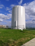 The station is near this large water tower.