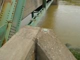 Eyelevel view of the disk on the bridge wingwall.