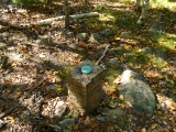 Eyelevel view of the disk on the granite post.
