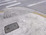 Eyelevel view of the disk in the sidewalk