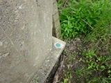 Eyelevel view of the disk in the corner of the bridge abutment