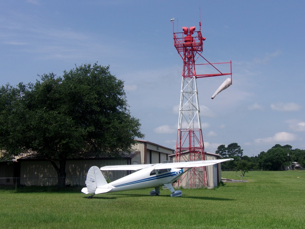 Harvey's 1947 Luscombe Model 8A "Silvaire" provides perspective as to the size and scope of his tower's restoration project. The 2-seat sportplane has a 35ft wingspan and a 6ft height.
