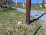 Eyelevel view of the disk and monument; looking N along Smith Gap Road